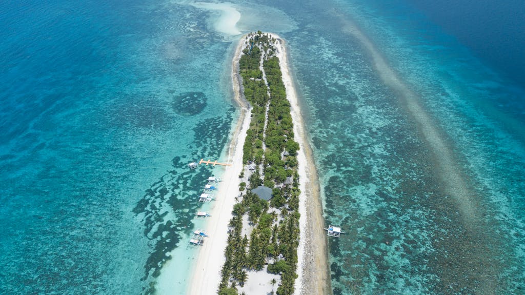 Stunning aerial photo showcasing the pristine beaches of Kalanggaman Island, Philippines.